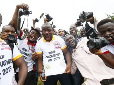 Members of the National Photographers Union of Liberia celebrate World Photography Day in Monrovia.