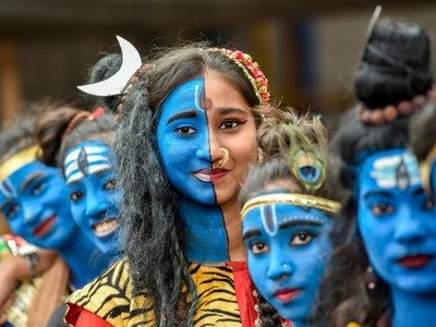 Students dressed up as Hindu gods Lord Krishna and Lord Shiva during the Janmashtami festival celebration, Aug. 21 in Mumbai.