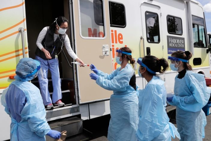 Spike in US deaths and cases flagged as pneumonia suggest even greater COVID-19 impact