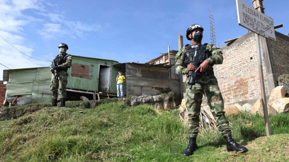 Defence Minister Carlos Holmes Trujillo said the decision to relieve the officials of their duties was made based on the allegations [File: Fernando Vergara/AP]