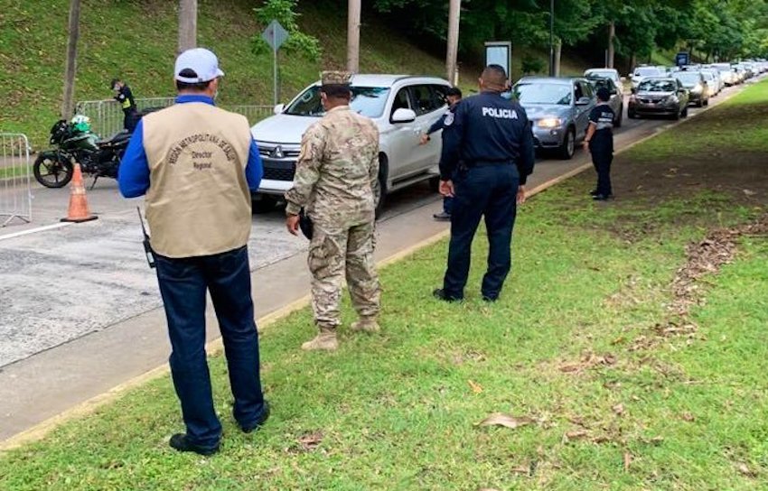 Authorities install checkpoints at the entrance to the Amador Causeway