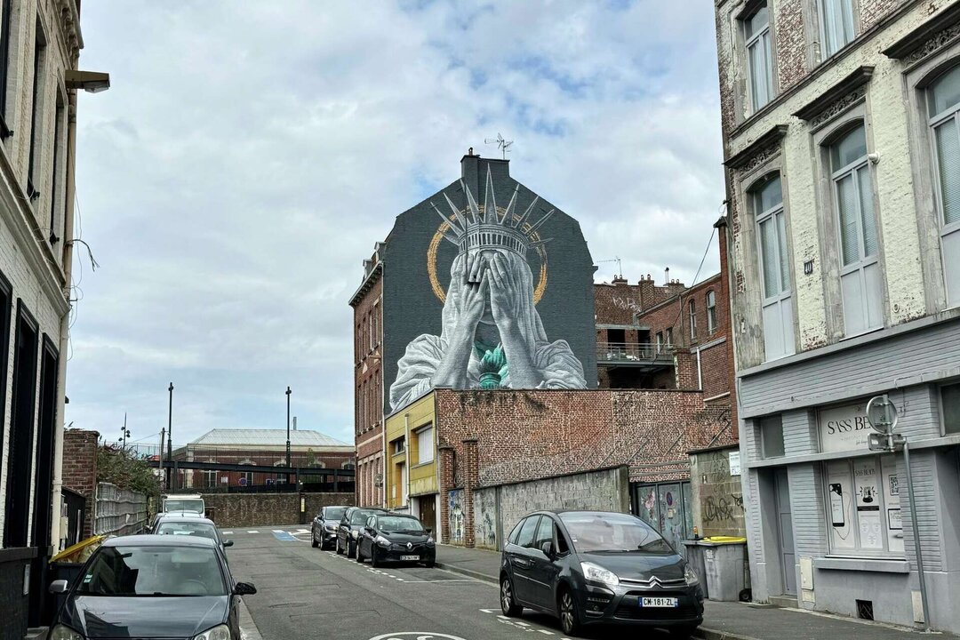 Mural of Statue of Liberty Covering Her Eyes in France Sparks Political Controversy