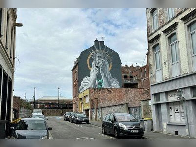 Mural of Statue of Liberty Covering Her Eyes in France Sparks Political Controversy
