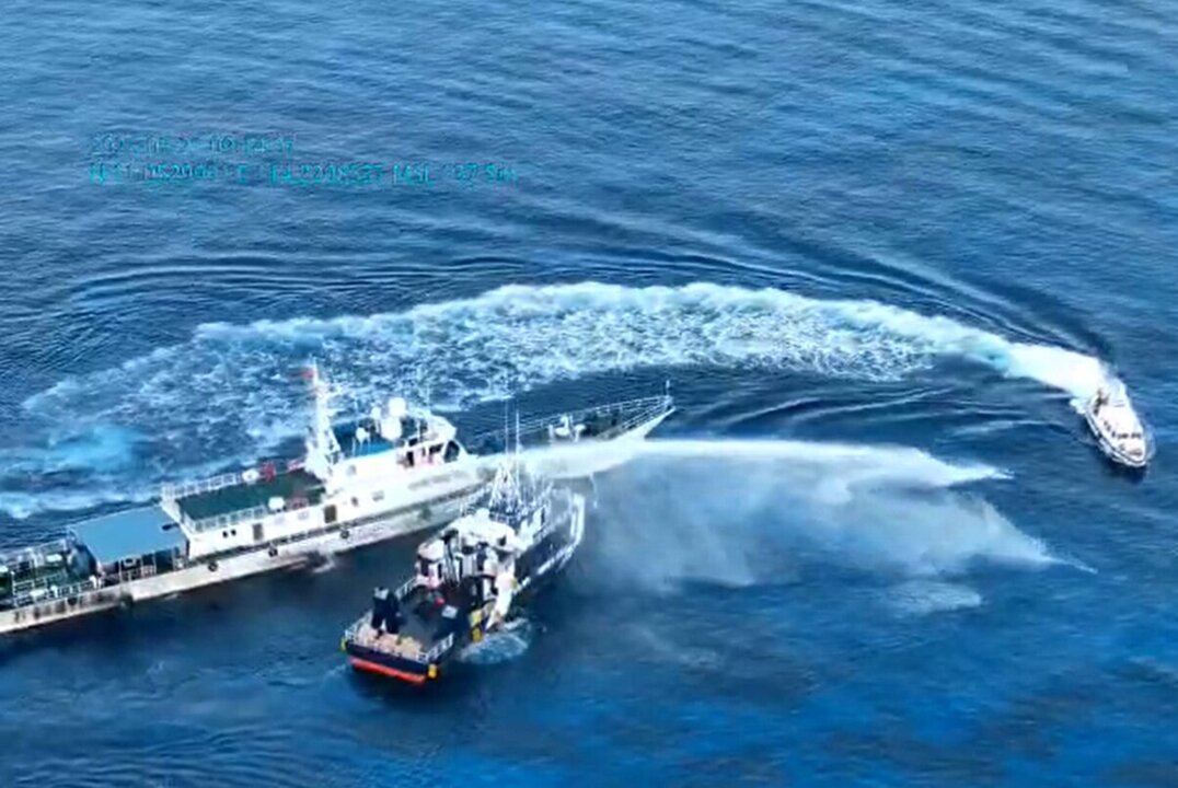 China Coast Guard Deploys Water Cannon in Clash off Sandy Cay
