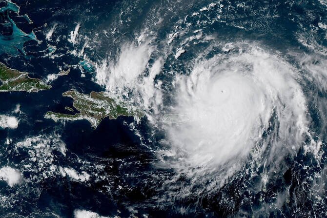 Erin Downgraded to Formidable Category 4 Hurricane