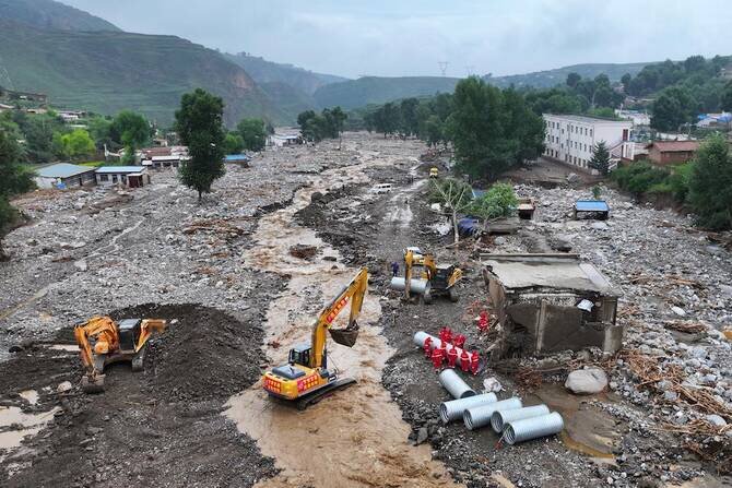 Heavy Rain in Northern China Raises Flood Death Toll to 13