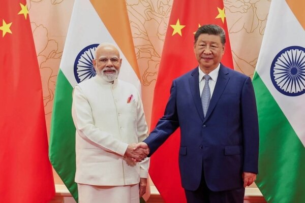 Xi and Modi Pledge to Ease Border Tensions at Northern China Summit