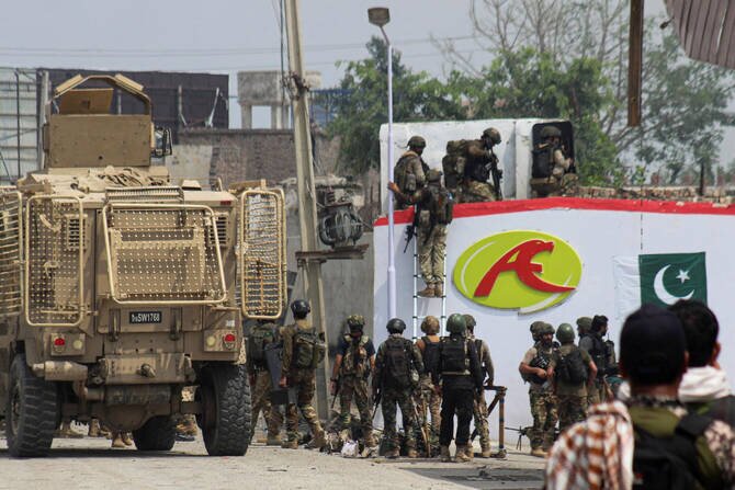 At least 22 killed in Pakistan, including at political rally