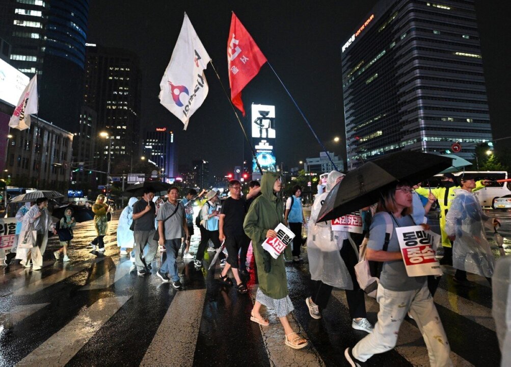South Koreans Welcomed Home After U.S. Detention