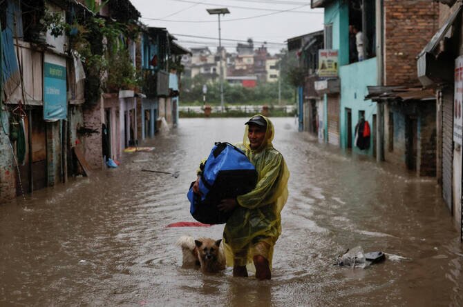 Heavy Rains Kill at Least 22 in Nepal, Block Roads