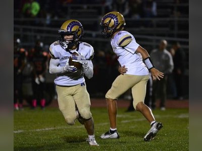 Amsterdam Football Team Shines with Top-Ranked Quarterback-Receiver Duo