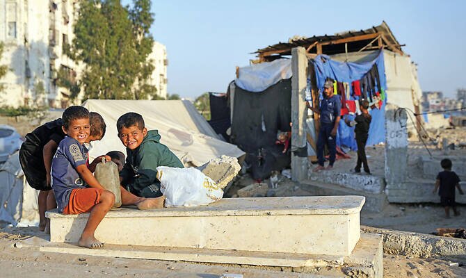 Gaza's Displaced Palestinians Find Shelter in Cemeteries