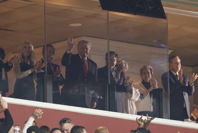 President Donald Trump Attends Washington Commanders Game Amid Mixed Reactions