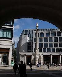 FTSE 100 Closes Little Changed as Investors Weigh Corporate Signals and U.S. Inflation Data