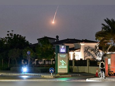 Missile Debris Sparks Fires at Dubai’s Jebel Ali Port Near Palm Jumeirah