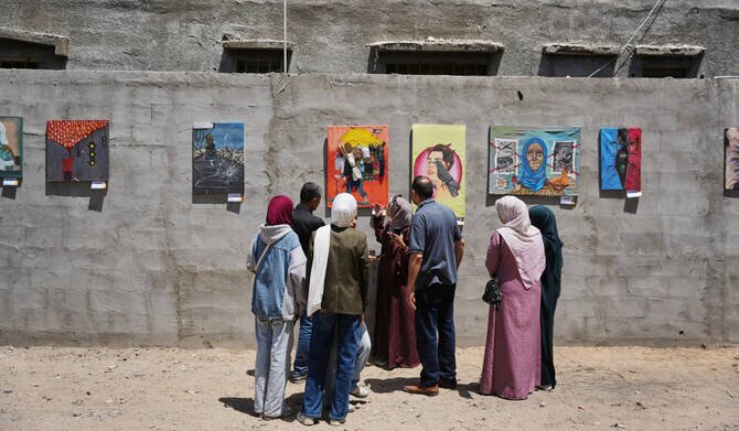 Young Palestinian artists in Gaza exhibit their impressions of war amid fragile ceasefire