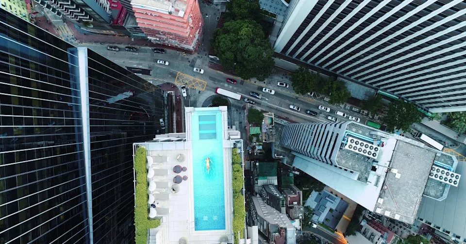 American Tourist Dies After 29th-Floor Fall at Hong Kong Hotel, Injuring Seven Below