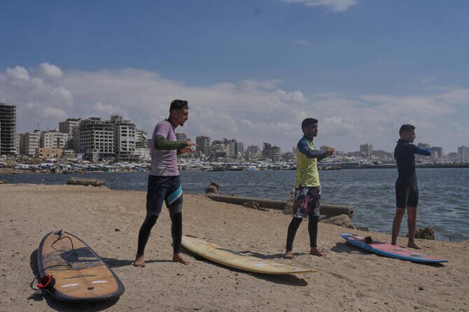 Surfers in War-Torn Gaza Find Rare Moments of Joy