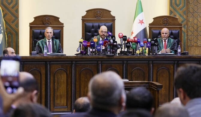 Syria Charges Former Security Official with War Crimes